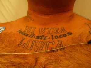 Figure 2. Mi vida Loca = My crazy life also seen as  in many patients; in this case, “LOWCA” is a reference to low riders and the automotive culture associated with them. The gang is “Lowell Street,” indicating a traditional Hispanic “turf gang” that is “loco”—crazy or brave.